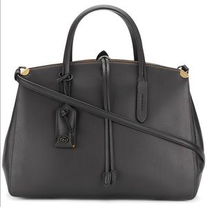 Coach Cooper Caryall